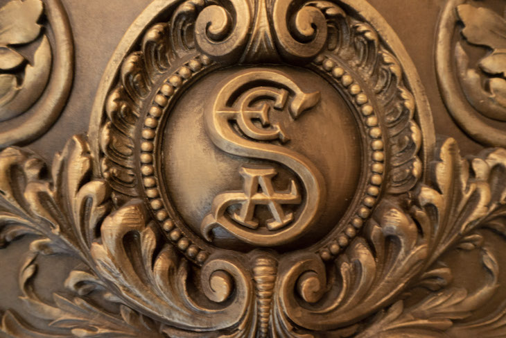 The SEA logo on the entrance door to Magellan's Restuarant